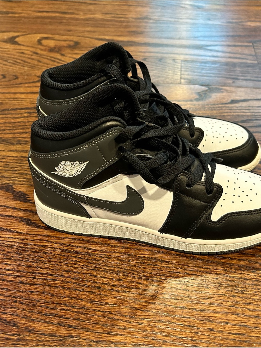 Jordan Kids Black and White High Top Sneakers